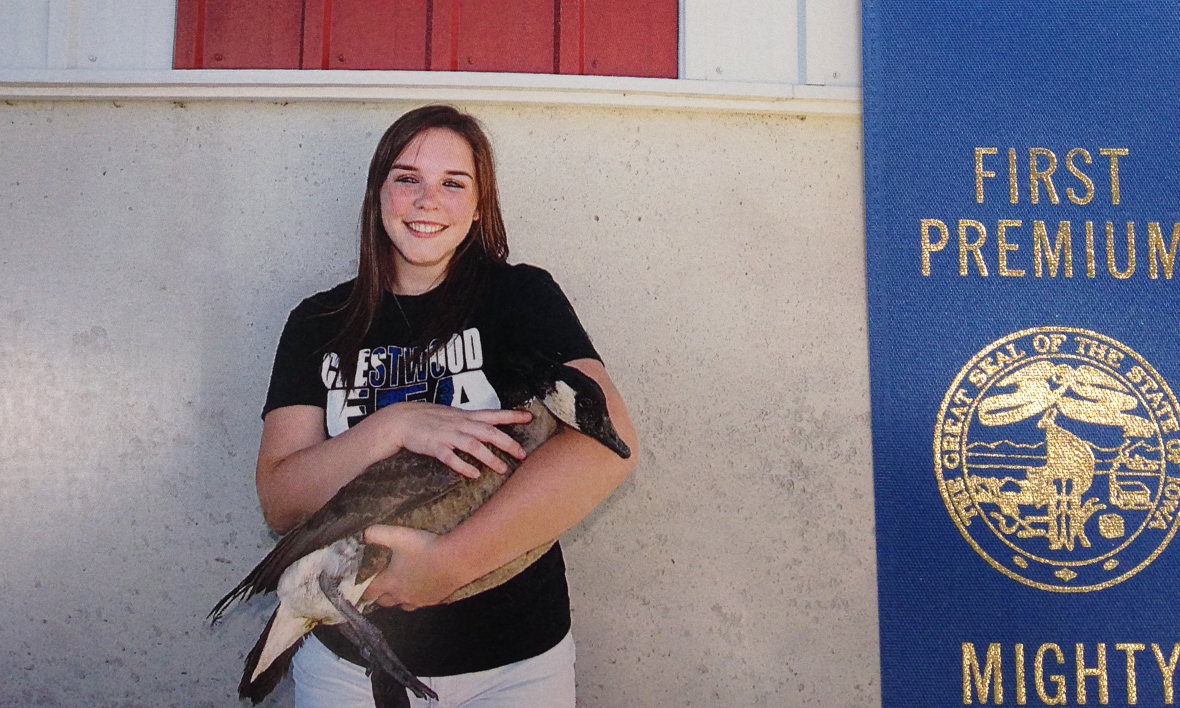 Kelly Dietzenbach with poultry project